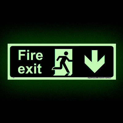 Fire exit below glow-in-the-dark sign
