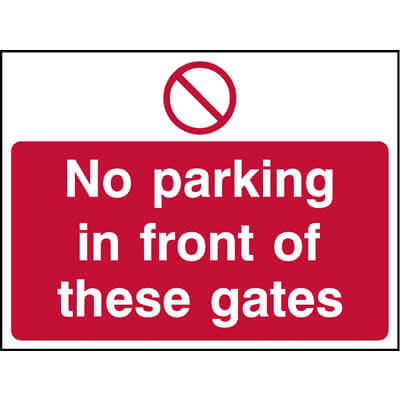 No parking in front of these gates sign